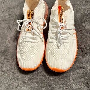 White and Orange Athletic Shoes